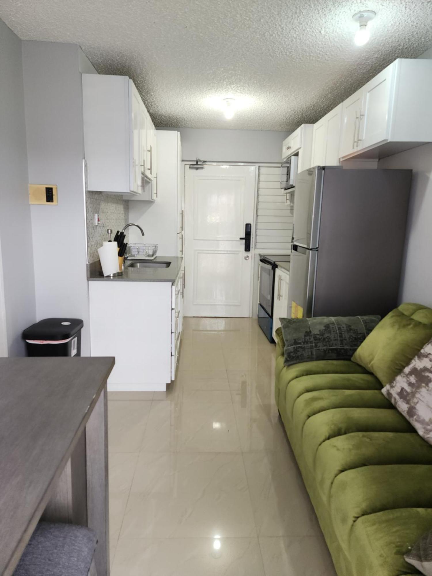 Comfy And Cozy Apartment Kingston Luaran gambar